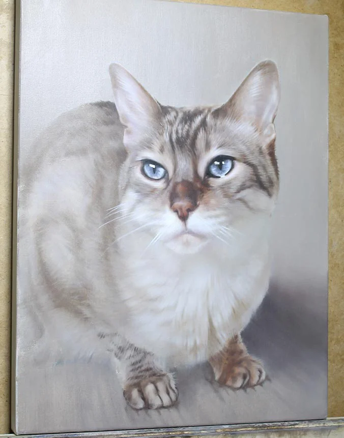 Tia’s cat oil portrait in progress on an artist's easel, showing initial layers.