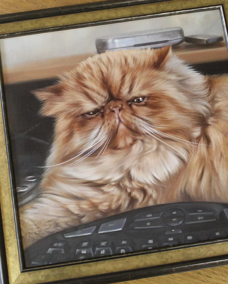 Cat Oil Portrait Displayed in Home Oil cat portrait of Puff displayed in a home setting.