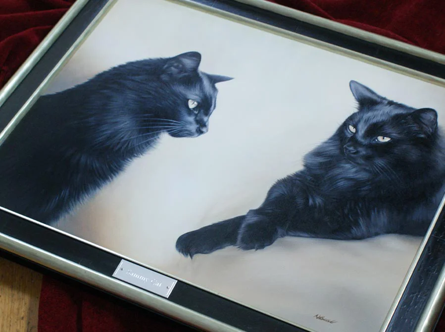 Framed Oil Painting of Black Cats on Wall, home display Framed oil painting of Sammy the black cat, displayed on a wall in a home