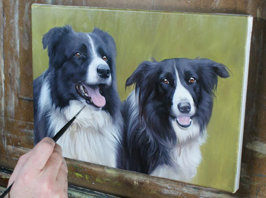 Work in progress on the Collie painting, showing refined details.