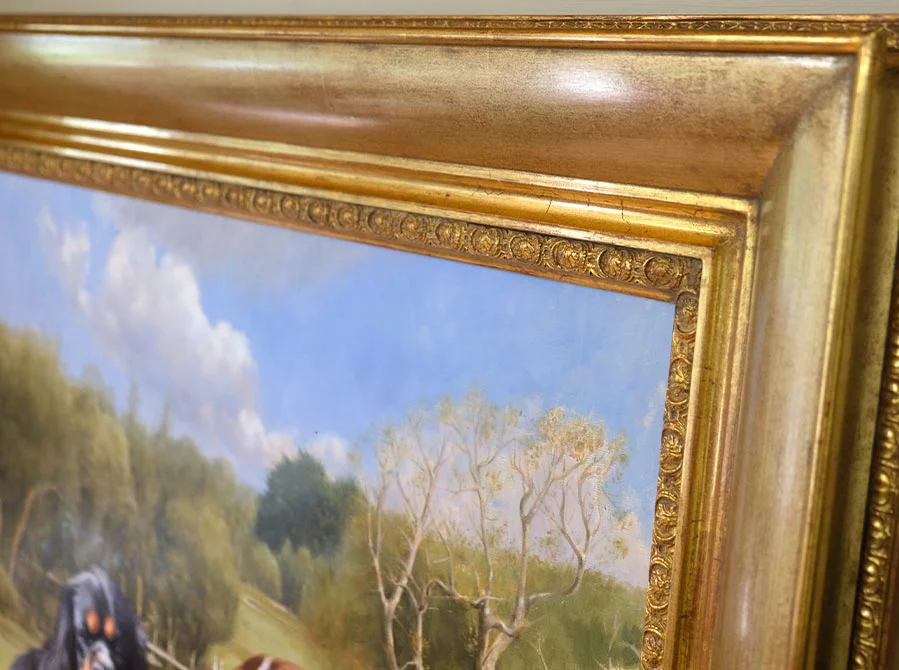 Framed Dog Portraits in Garden The finished, framed oil portrait of Bilbo and Mr Kipling in their garden, ready for display.