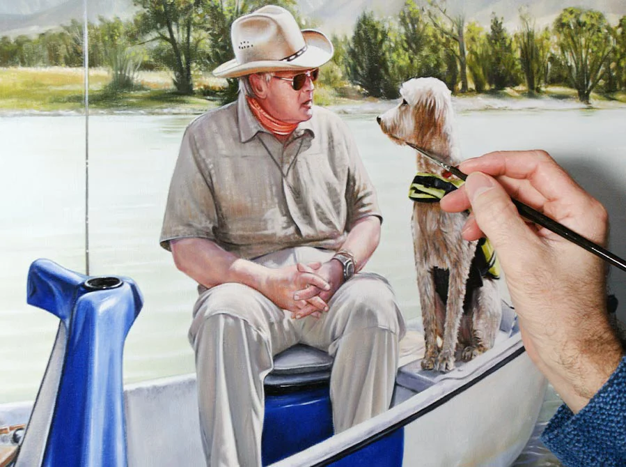 The completed oil painting of Henry and Daisy's landscape portrait displayed on an easel in the artist's studio.
