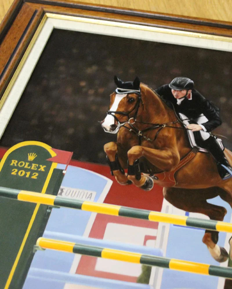 Horse Oil Painting Displayed in Frame Horse oil painting of CC Top displayed in a frame.