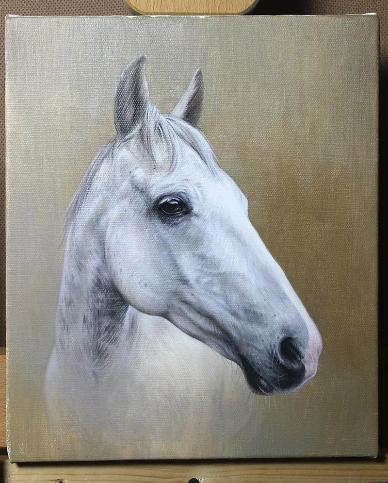 Work in Progress – Horse Oil Painting by Nicholas Beall An oil painting of Artu the horse on an easel, illustrating the detailed work in progress on the horse's mane and facial features.
