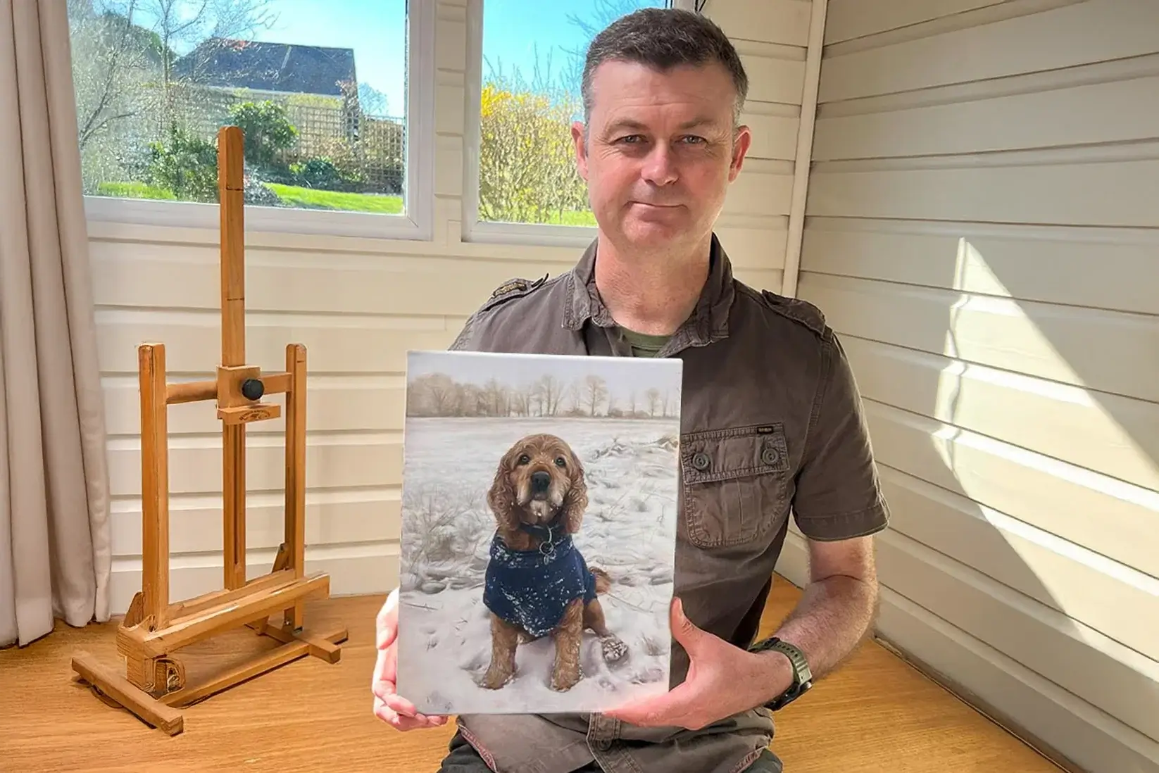 Oil painting of Milo the spaniel in snow, commissioned by actor John Nettles for his granddaughter