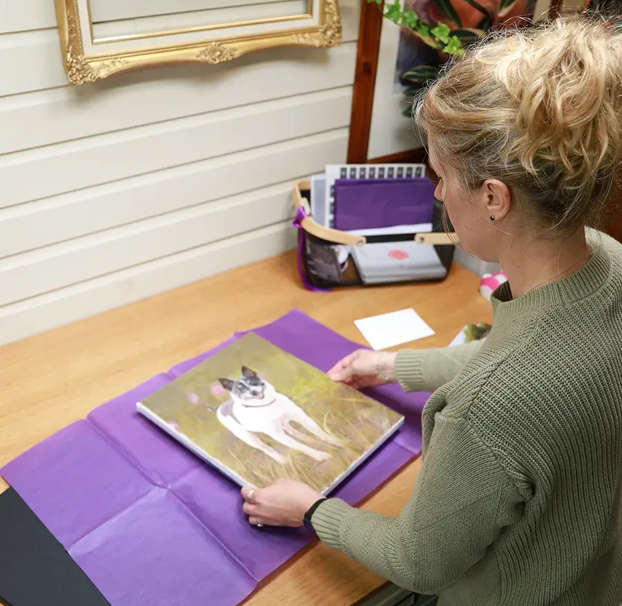 Portrait being secured in custom-sized box