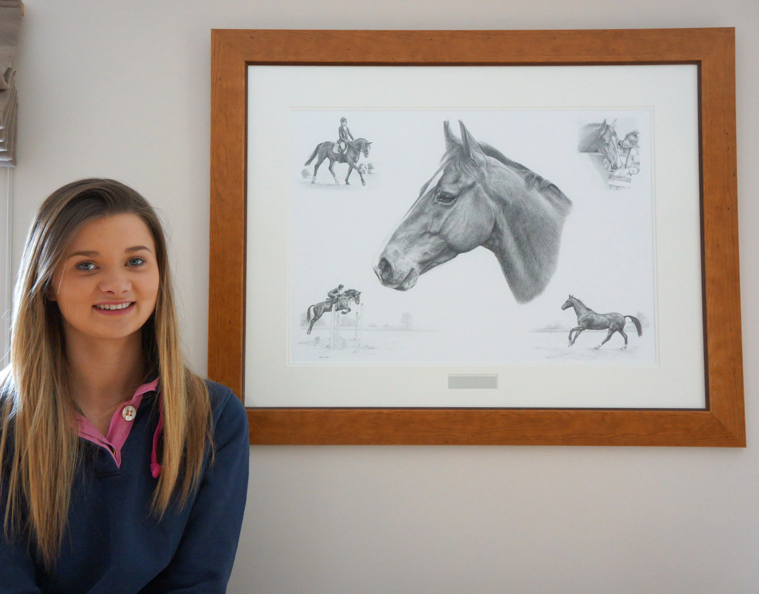 Framed Horse Portrait Montage – Pencil Drawing with Happy Client Happy client, Olivia, proudly holding her framed pencil portrait montage of her horse, Casanova, featuring various riding and jumping scenes.