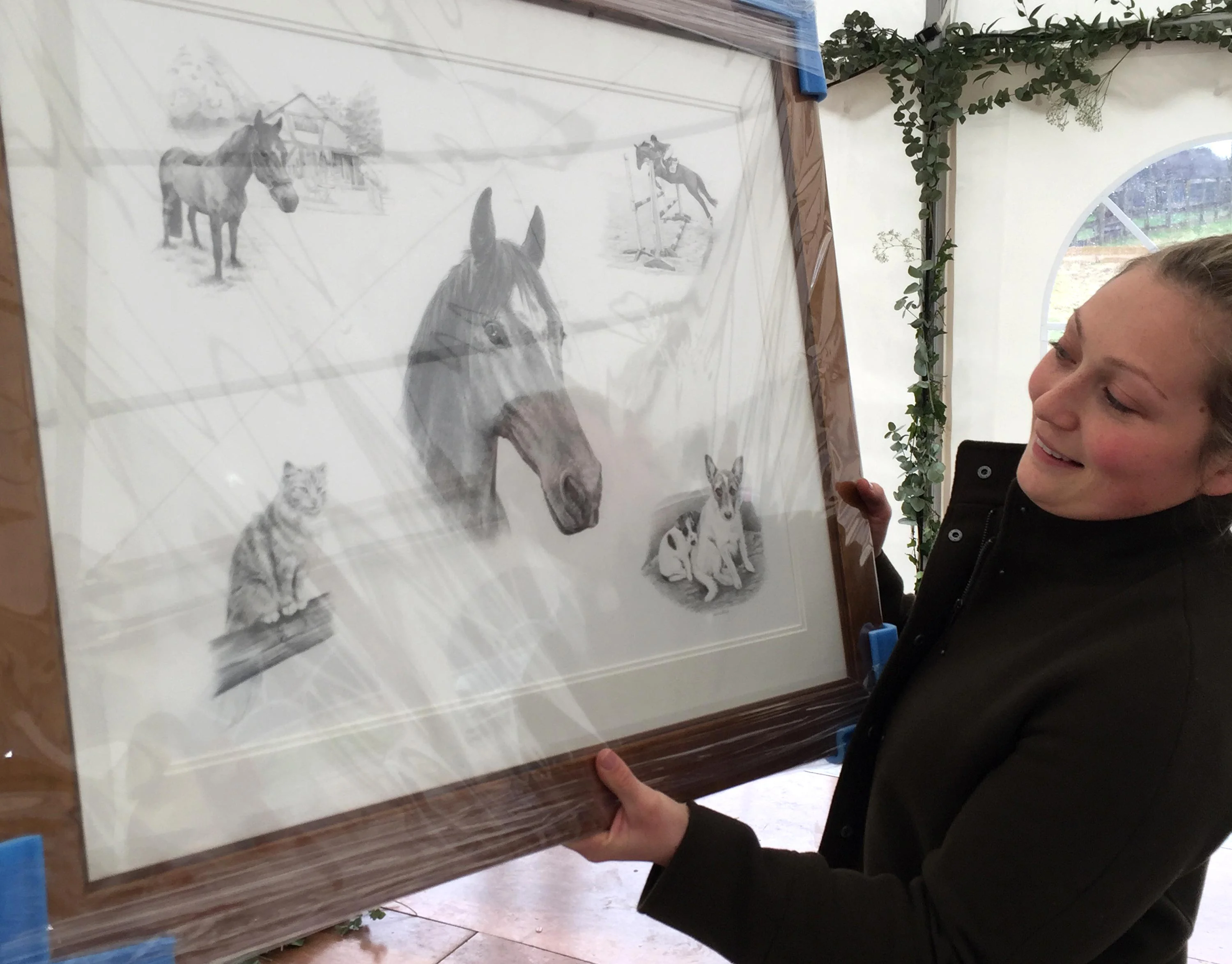 Framed Horse Montage in Pencil – Bespoke Pet Portraits by Melanie Phillips A beautifully framed pencil montage portrait by Melanie Phillips, showcasing a horse, two Jack Russell dogs, and a cat, ready for display.