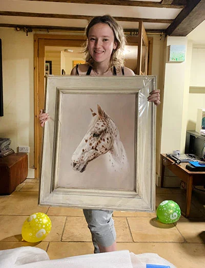 Client Craig's Horse Portrait Testimonial Happy client Craig's daughter joyfully receiving a custom oil portrait of her horse, beautifully framed and ready to hang.